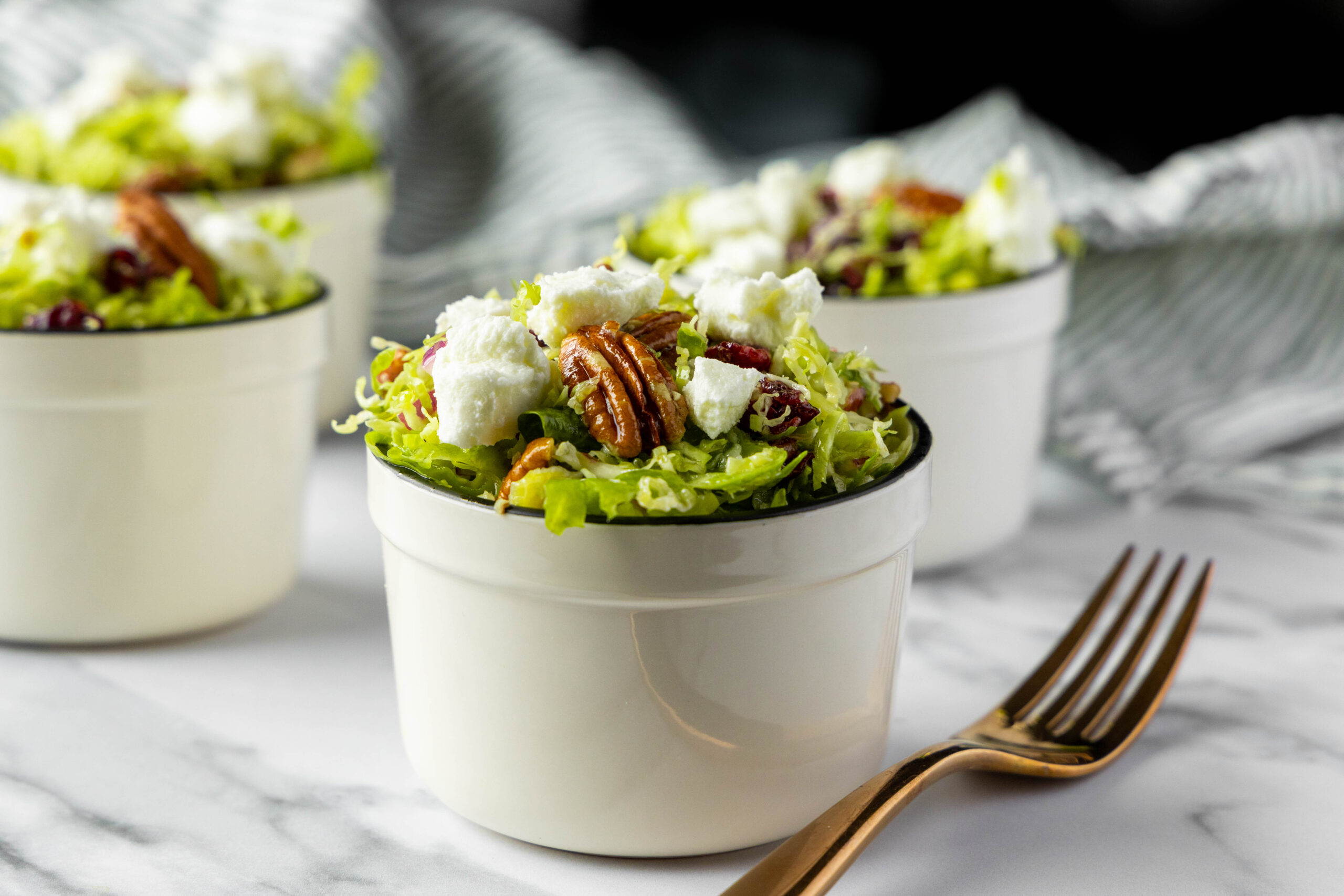 Brussels Sprout Salad with Apple Maple Dressing - Community Natural Foods