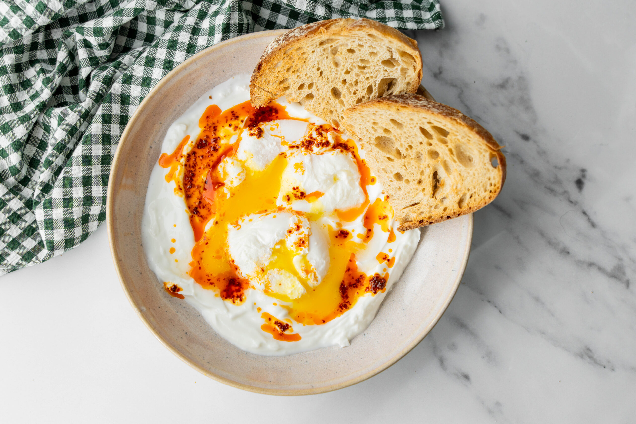 Turkish Eggs Cilbir with Aleppo Brown Butter - Community Natural Foods